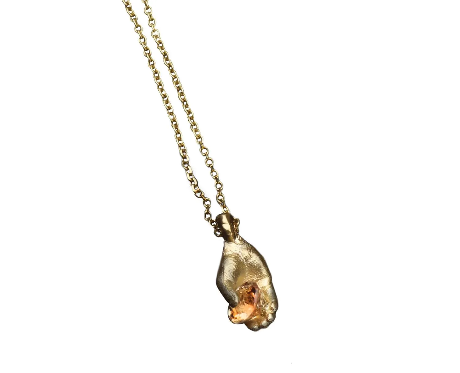 Hand with Peach Sapphire Pendant